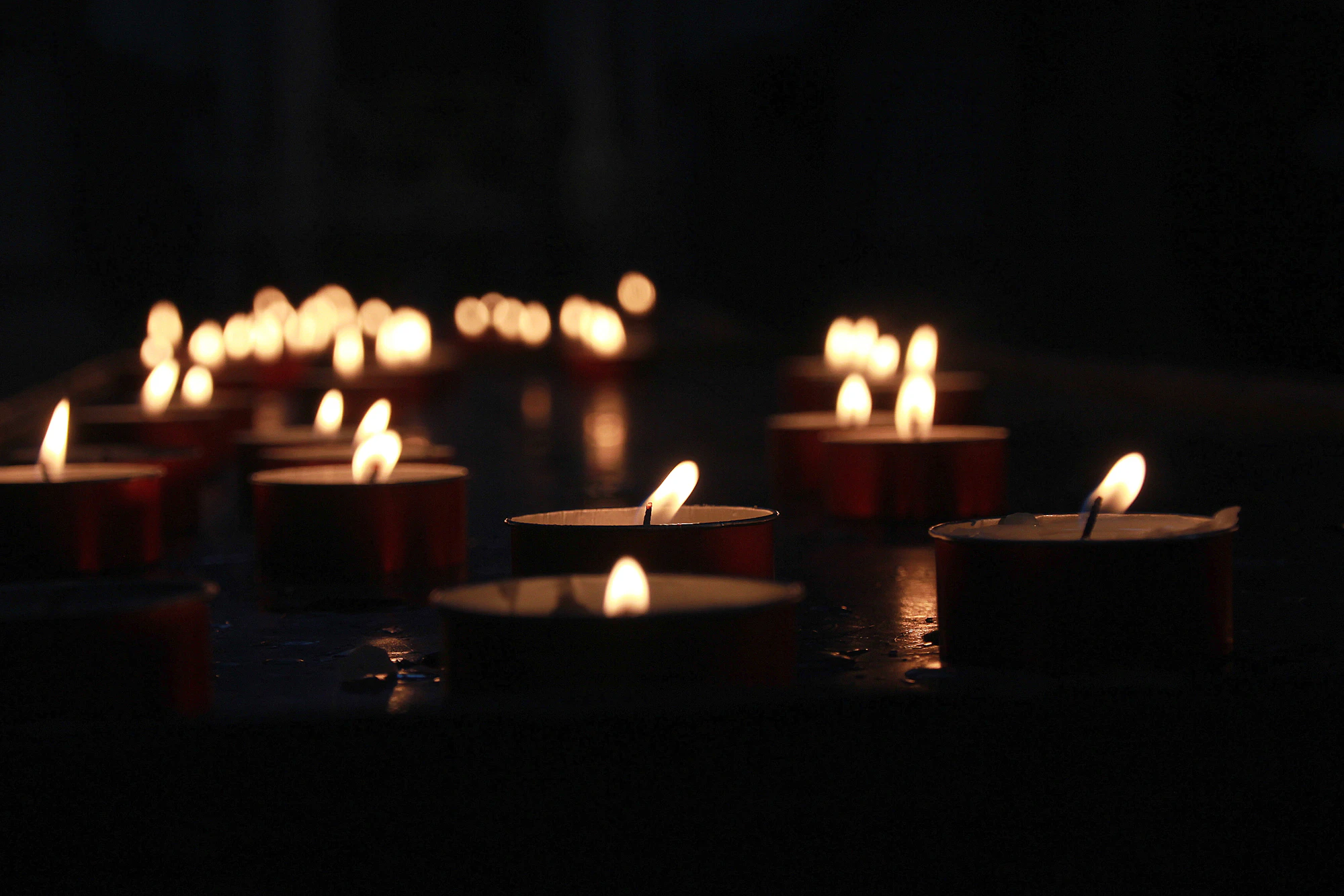 Lit tealight candles